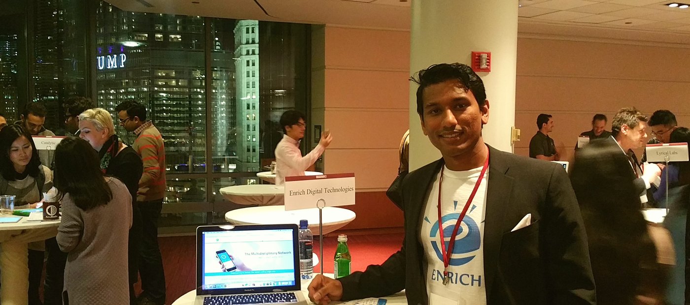 Chicago, October 2016 — Enrich Digital Technologies stand, early concept of The Multidisciplinary Network visible on the laptop screen